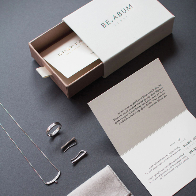 Hersteller von kundenspezifischen Ohrringverpackungen aus Papier